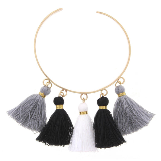 Gold Metal Cuff Bracelet with Jet, Grey, and White Tassels