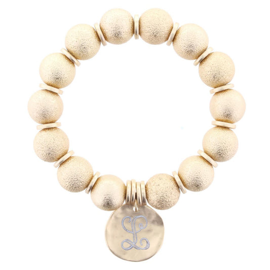 Gold Beaded Stretch Bracelet with "L" Engraved Gold Disk