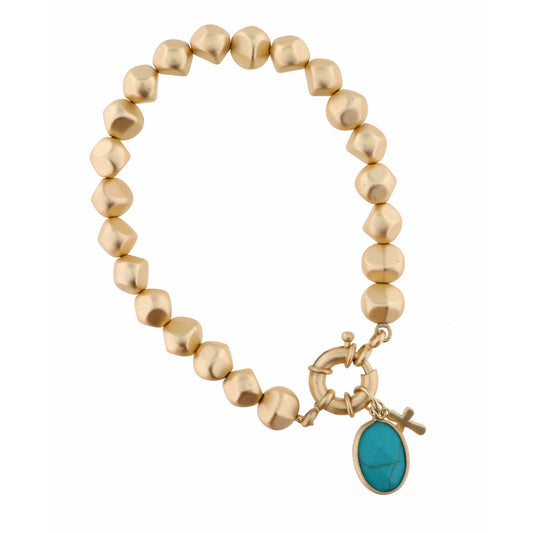Turquoise Oval with Cross Charm on Gold Beaded Strand Bracelet