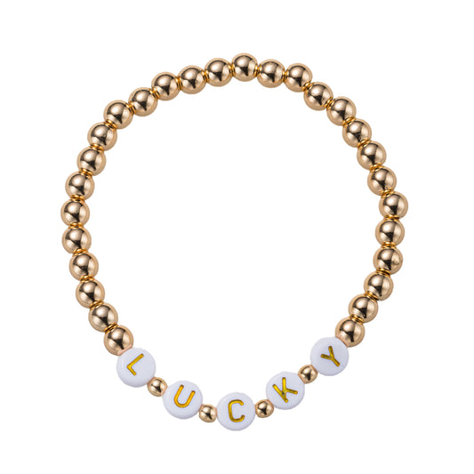 Gold Beaded Stretch Bracelet with "Luck"