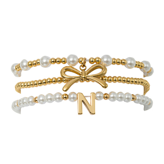 18K Gold Plated Set of 3 Gold, Pearl Beaded Stretch Bracelet with Gold Bow & Initial "N"